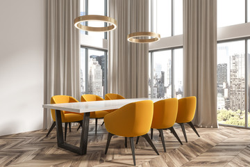 White dining room corner, beige curtains