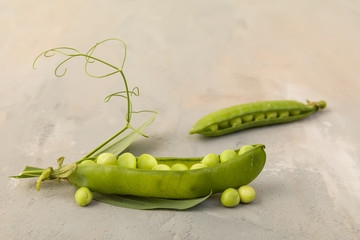 Peapods and tendrils on a table