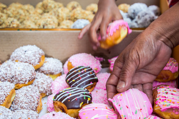 Want to pick that Strawberry frosted Doughnut.