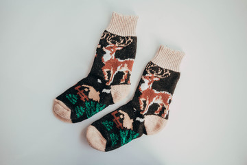 Handmade knitted socks for the cold season. View from above. Many different blue color socks.