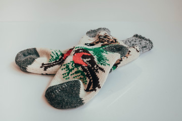 Handmade knitted socks for the cold season. View from above. Many different blue color socks.