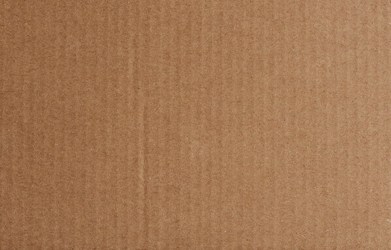 Close-up of brown cardboard paper texture 