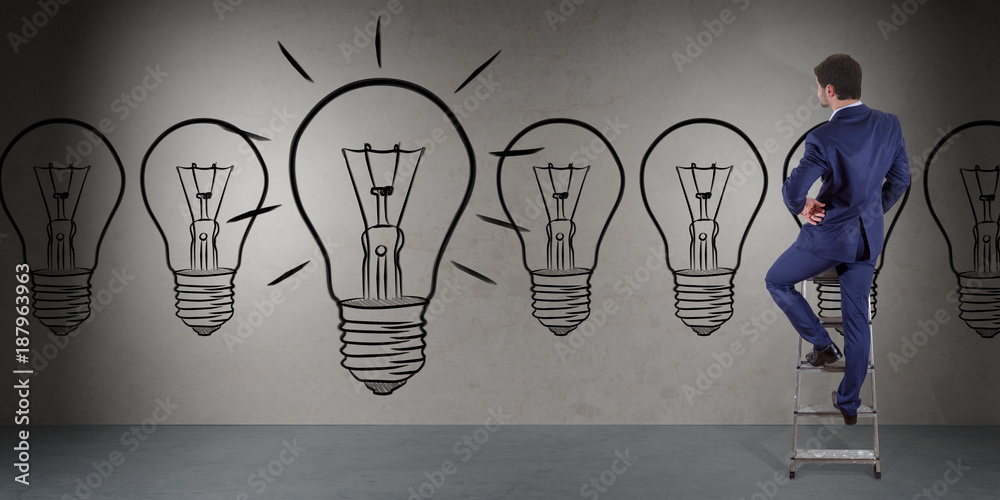 Poster businessman watching a lightbulb on a wall 3d rendering