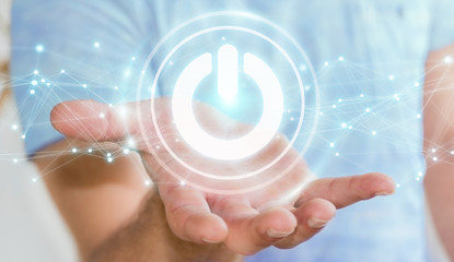 Businessman using 3D render power button with connections