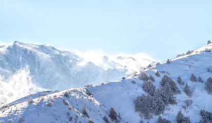 Fototapeta na wymiar Snow on a mountain slope