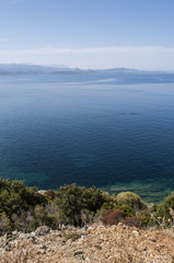 Corsica, 28/08/2017: la costa frastagliata del versante ovest del Capo Corso, la penisola famosa per il suo paesaggio selvaggio