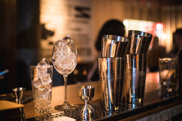 Empty glasses on table in night club or restaurant, closeup