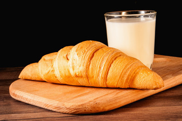 croissant and a glass of milk