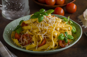 Pasta semolina with tomatoes and parmesan cheese