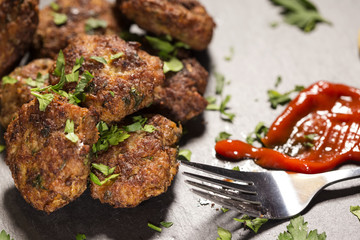 Eating homemade Meatballs made from pork, beef and vegetables