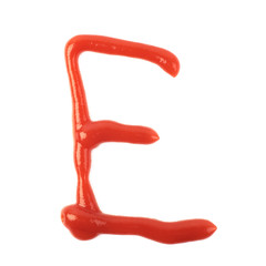 Single letter made of sauce isolated