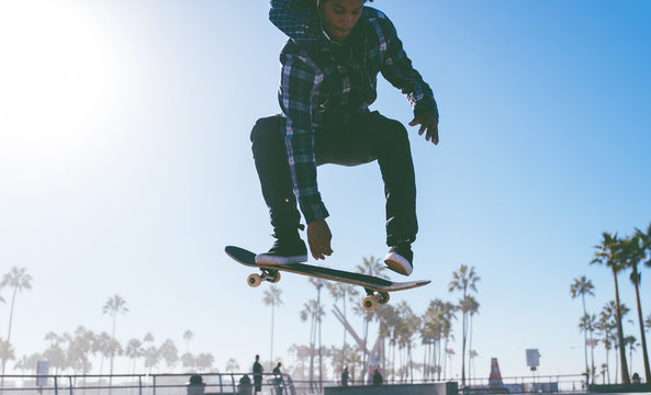 Skater boy practicing at the skate park