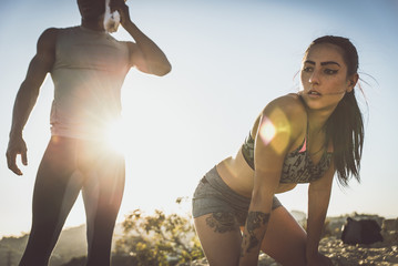 Couple running in los angeles canyons.