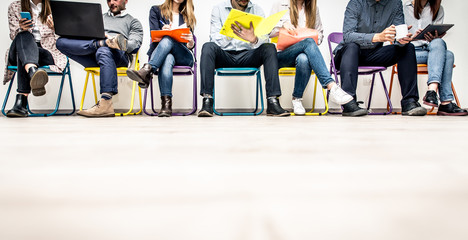 Start up people sitting in a row