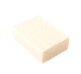 Beige piece of soap isolated