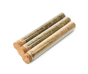 Herbal spices in a glass vial isolated