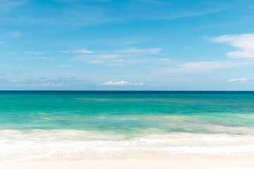 Fototapeta na wymiar Clear blue sea and sky with white clouds. Ocean lanscape. Bali island, Indonesia.