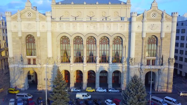 Budapest, Hungary - Aerial drone footage of Vigado Concert Hall with St. Stephens Basilica at sunset