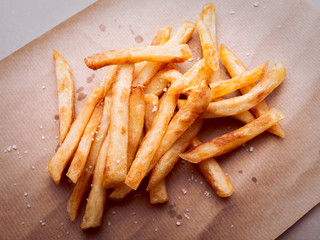 Closeup of a french fries with salt