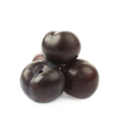 Pile of black plums isolated