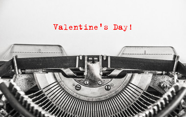 written with the vintage typewriter Valentine's Day in red ink.