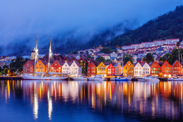 Bergen street at night with boats in Norway - obrazy, fototapety, plakaty