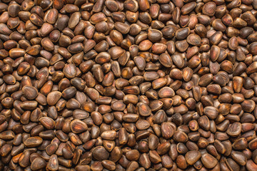Not a lot of shelled pine nuts - background
