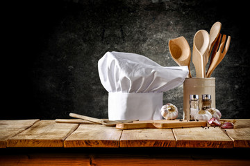 cook hat and wooden table space 