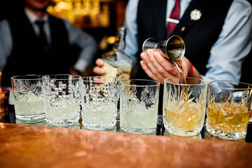 Barman make a cocktail