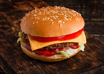 Classic beef cheeseburger with vegetables