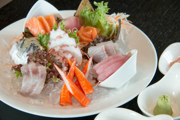 Sashimi served on ice in big plate