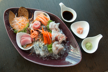 Sashimi served on ice in big plate