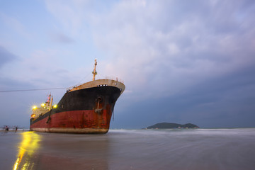 Cargo ship got stuck on the beach, Ship accidents happen often when the weather is stormy.