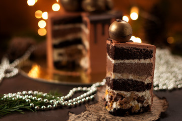 festive cake layers chocolate ball golden plate