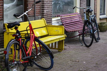 Fototapeta na wymiar Two bicycles and benches