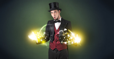 Magician holding his power on his hand