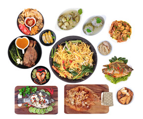 Food is sacred in the Chinese new year, such as fish, pork, shrimp, crab, bamboo shoots, tofu, desserts and fried yellow noodle in  Chinese style placed on red velvet cloth.