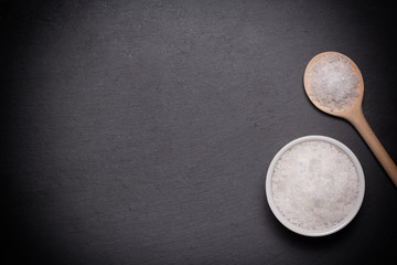 spoon and bowl with sea salt with vignette