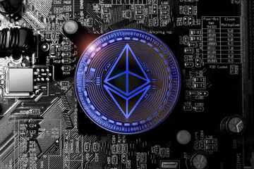 ethereum coin on an computer motherboard blue style