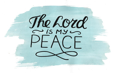 Hand lettering The Lord is my peace, made on watercolor background.