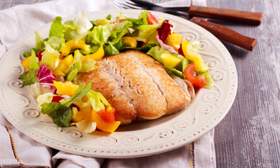 Fried white fish and salad