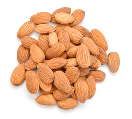Obraz na płótnie Canvas Heap of almond nuts isolated on white background