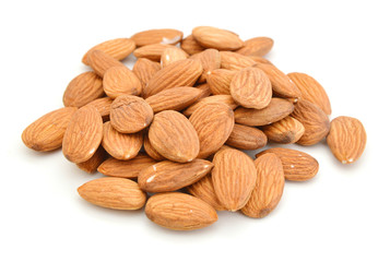Heap of almond nuts isolated on white background