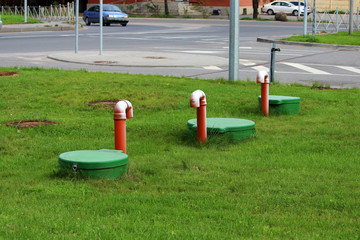 Tube of plastic tank gas oil catcher in the ground on the territory of the gas station, Russia
