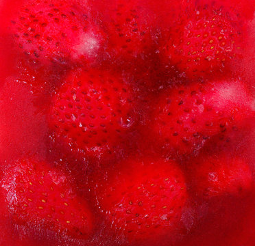 Strawberry frozen in ice.