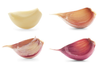 Set with raw fresh garlic on white background