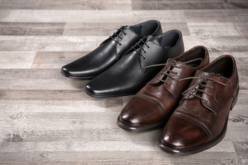 Elegant leather men's shoes on floor