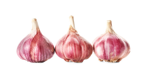 Fresh garlic heads on white background