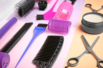 Professional hairdresser set on color background
