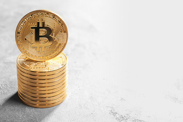 Golden bitcoins on grunge background